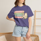 Cozy Bookstack Tee — Pastel Books, Candle & Rose Graphic T‑Shirt