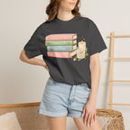 Cozy Bookstack Tee — Pastel Books, Candle & Rose Graphic T‑Shirt