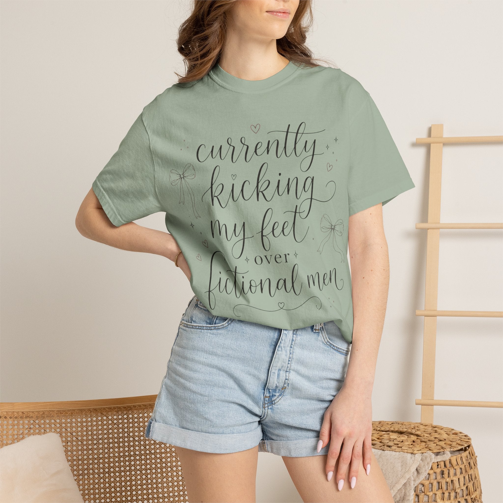 Graphic T-Shirt — “Currently Kicking My Feet Over Fictional Men” Printed Tee for Book Lovers