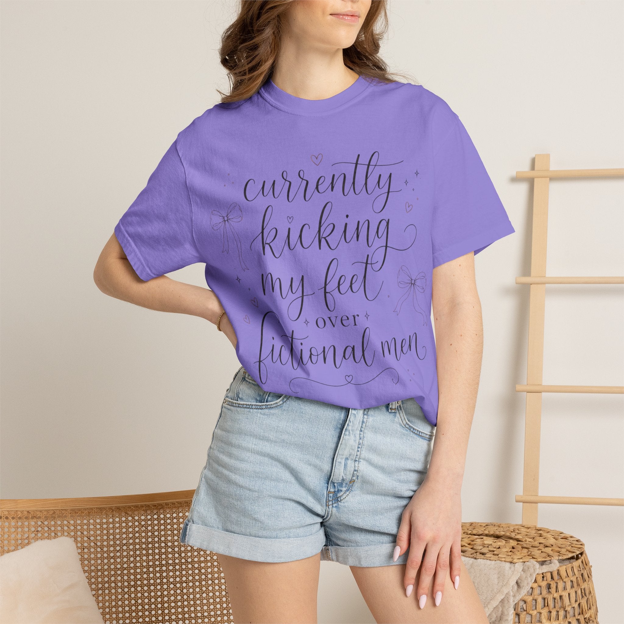 Graphic T-Shirt — “Currently Kicking My Feet Over Fictional Men” Printed Tee for Book Lovers