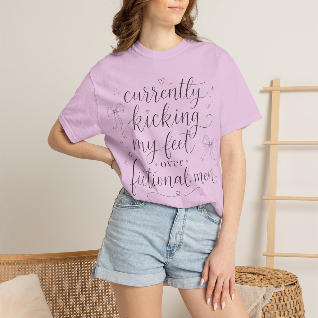 Graphic T-Shirt — “Currently Kicking My Feet Over Fictional Men” Printed Tee for Book Lovers
