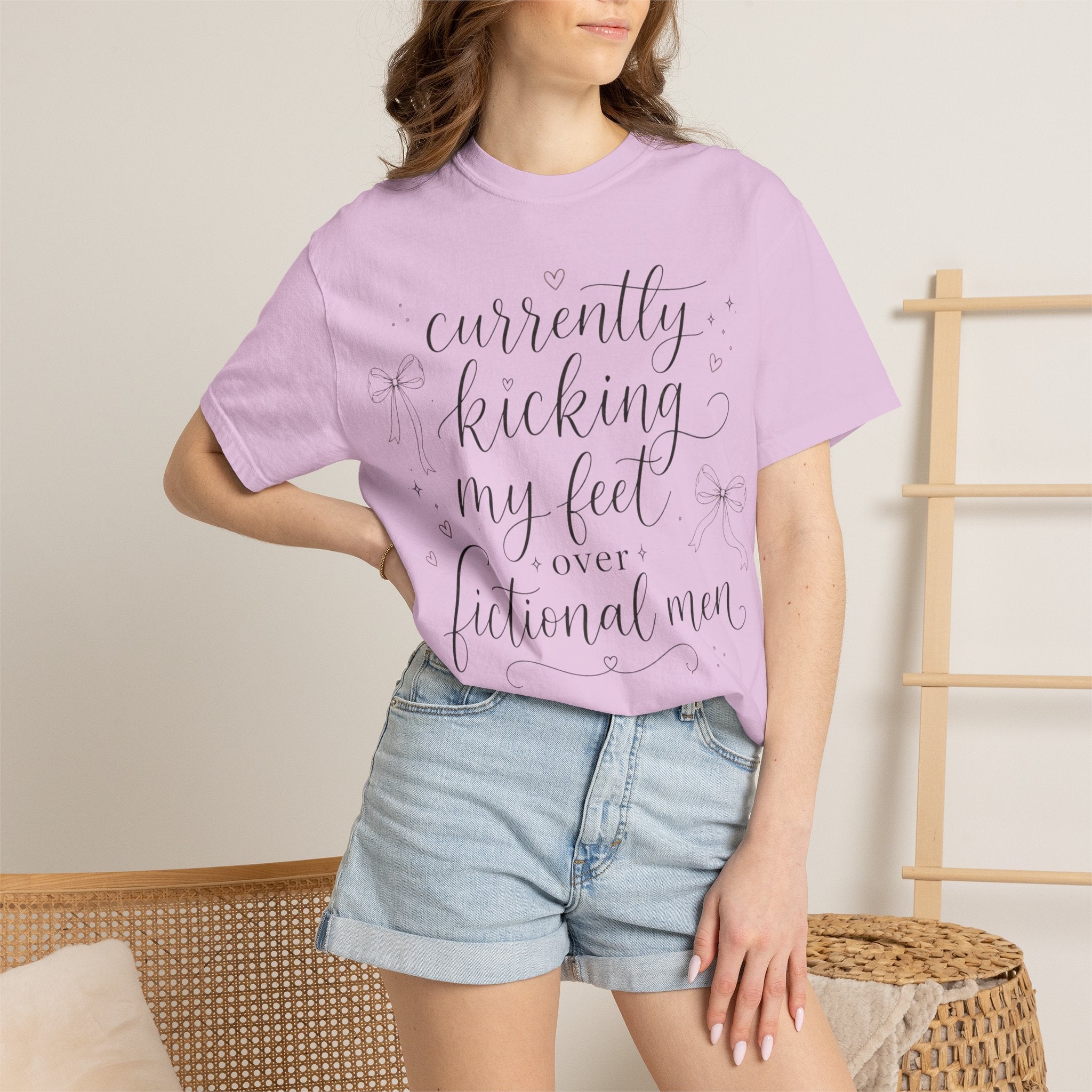 Graphic T-Shirt — “Currently Kicking My Feet Over Fictional Men” Printed Tee for Book Lovers