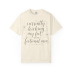 Graphic T-Shirt — “Currently Kicking My Feet Over Fictional Men” Printed Tee for Book Lovers