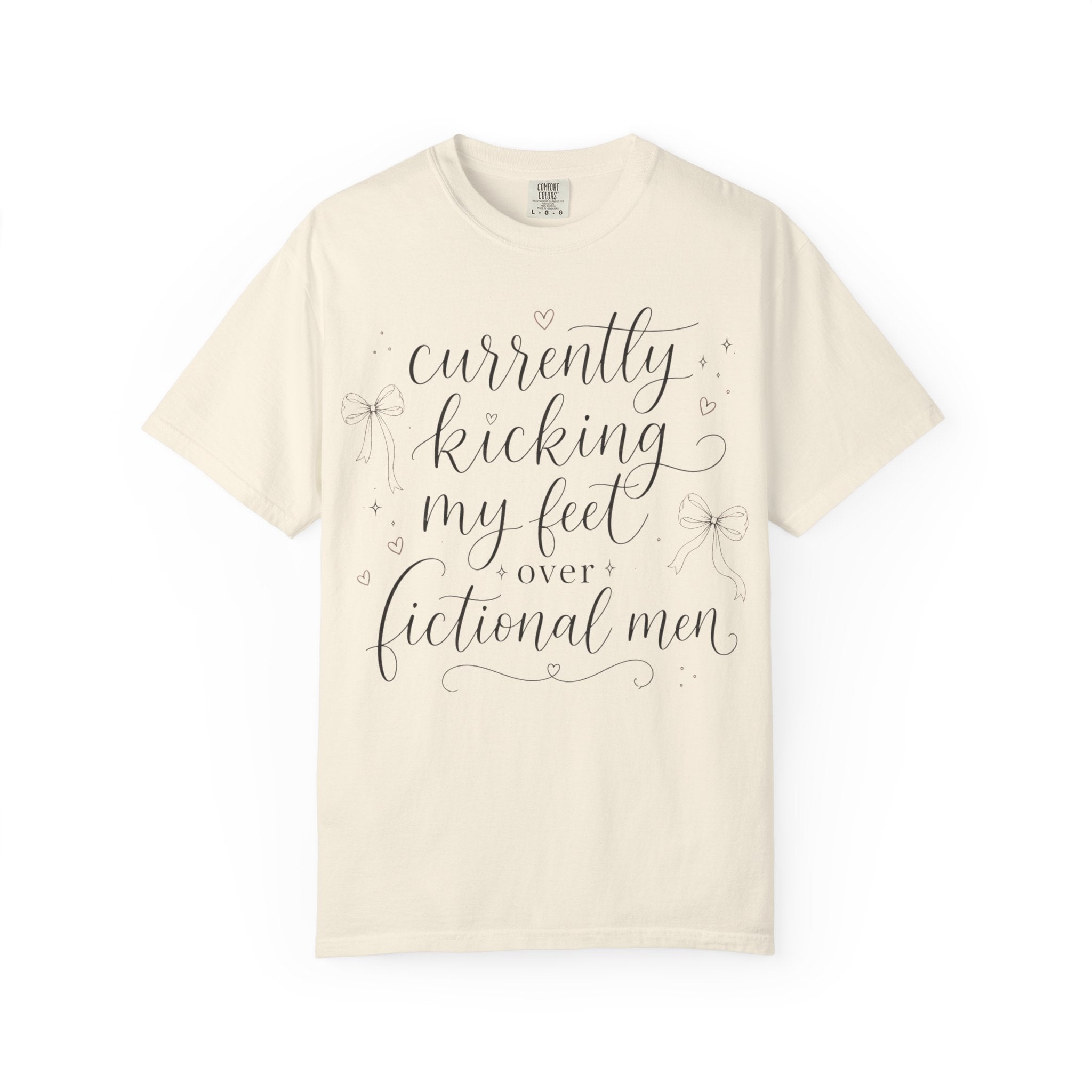 Graphic T-Shirt — “Currently Kicking My Feet Over Fictional Men” Printed Tee for Book Lovers