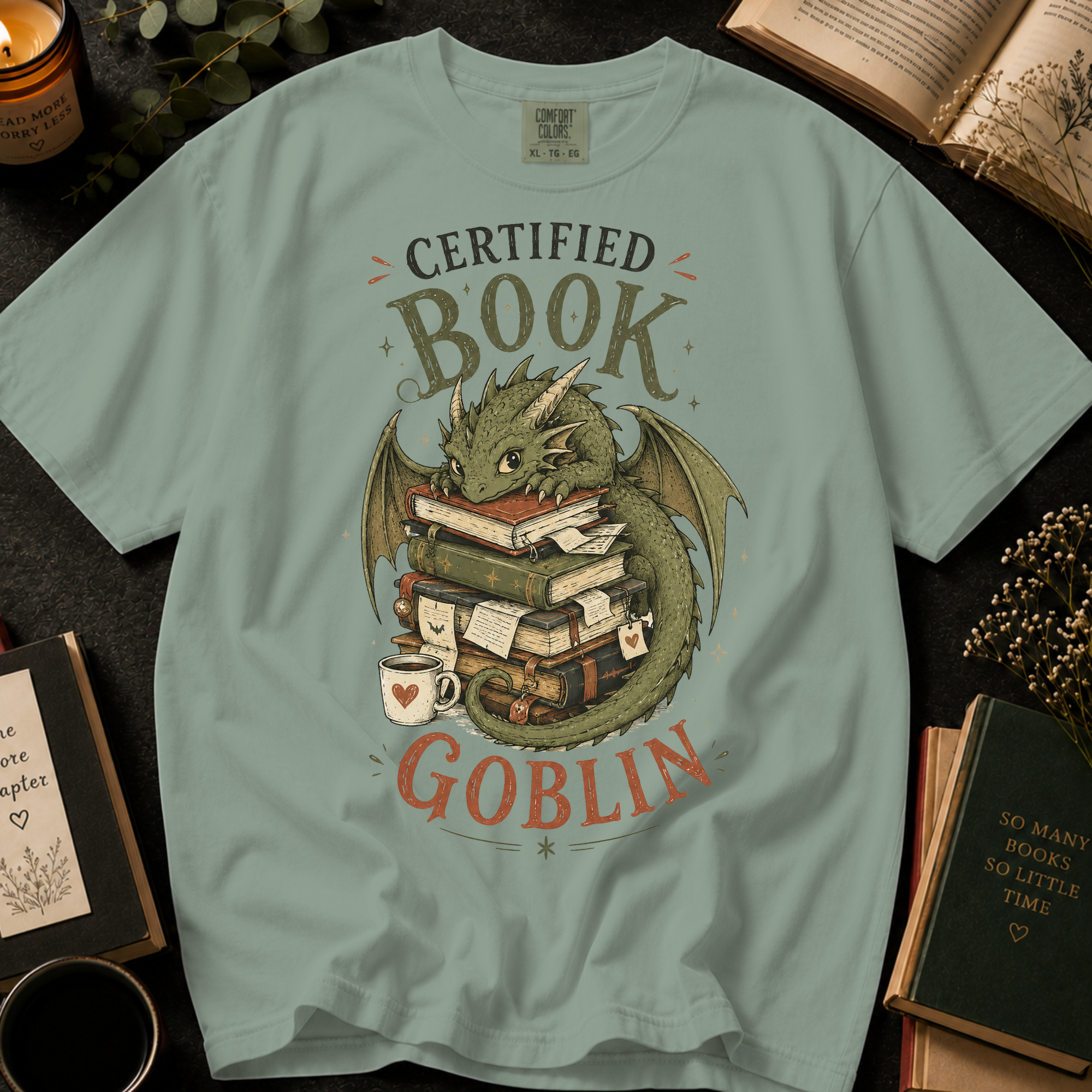 Certified Book Goblin T-Shirt: Cute Dragon Hoarding Books in Bay - Comfort Colors® T-Shirt