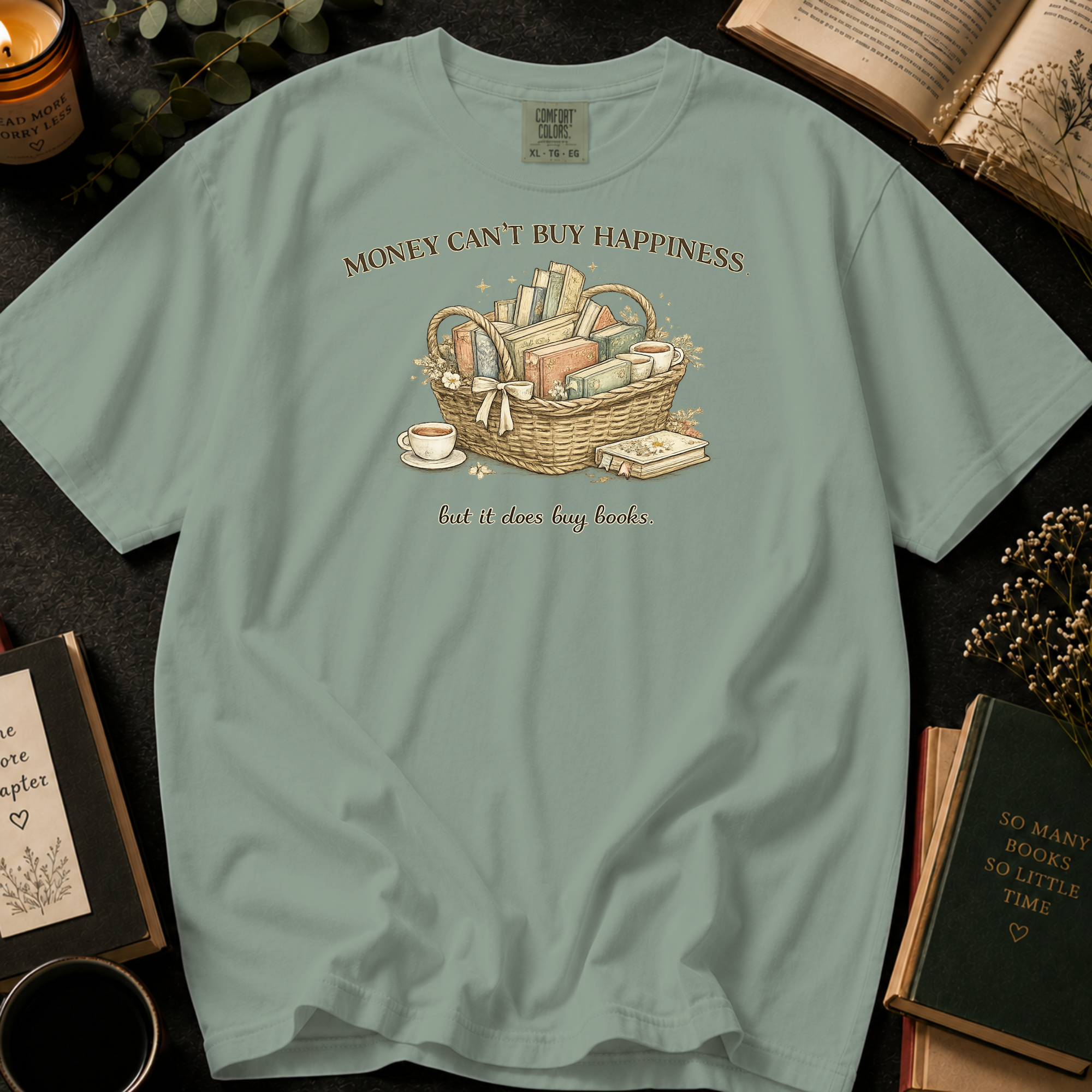 Money Can't Buy Happiness But It Does Buy Books T-Shirt: Book Basket in Bay - Comfort Colors® T-Shirt