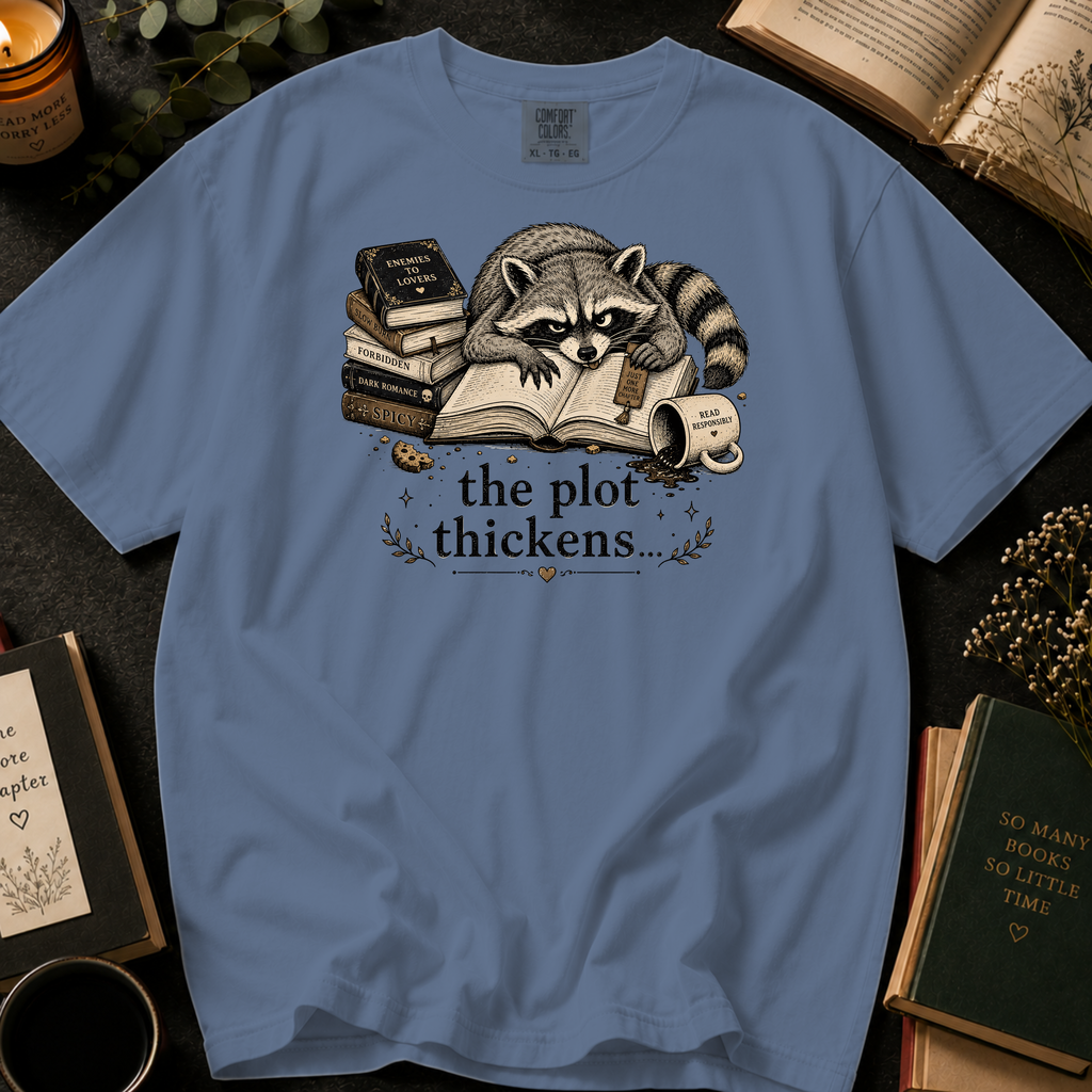 The Plot Thickens T-Shirt: Grumpy Raccoon Reading in Blue Jean - Comfort Colors® T-Shirt
