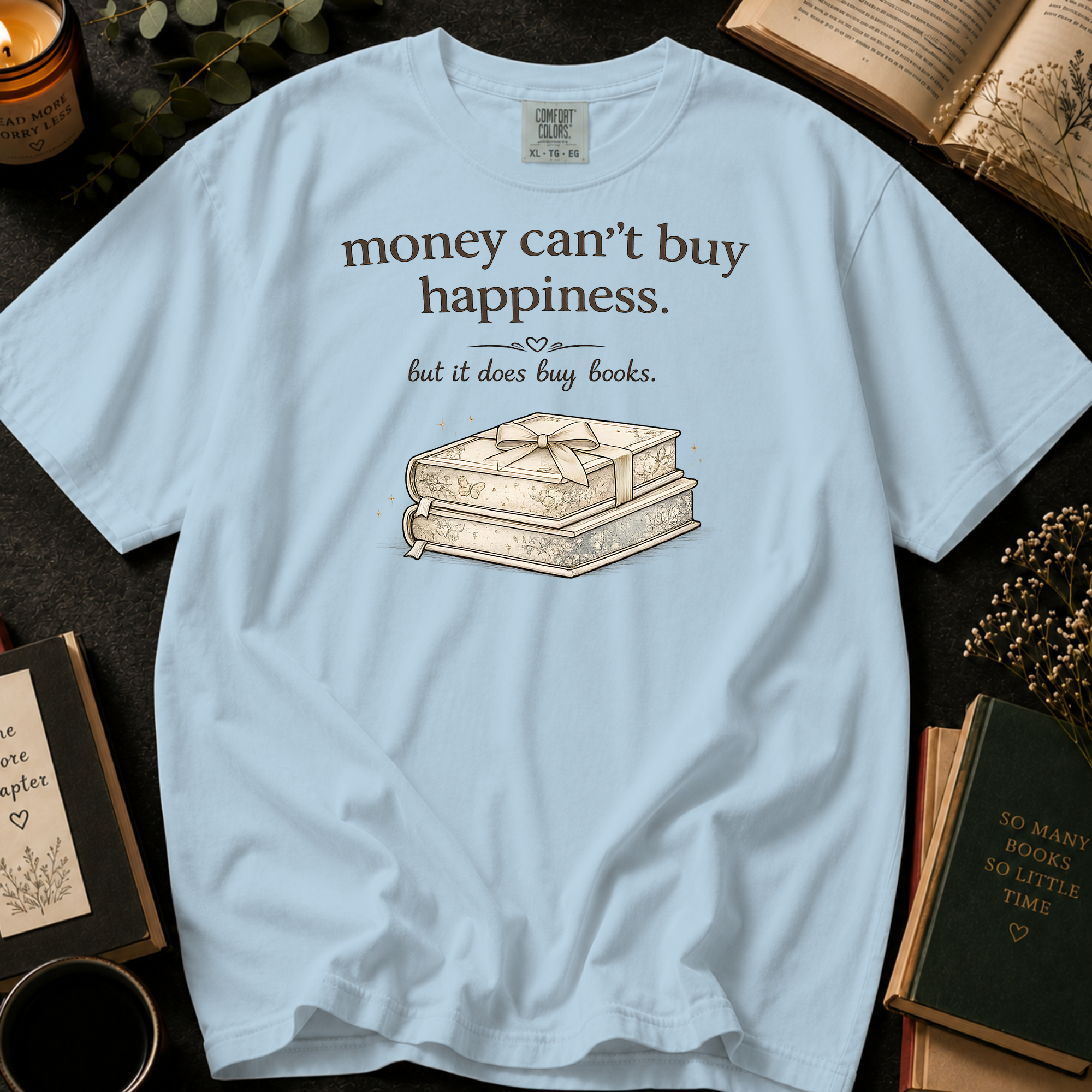 Money Can't Buy Happiness But It Does Buy Books T-Shirt: Gift Wrapped Stack in Chambray - Comfort Colors® T-Shirt