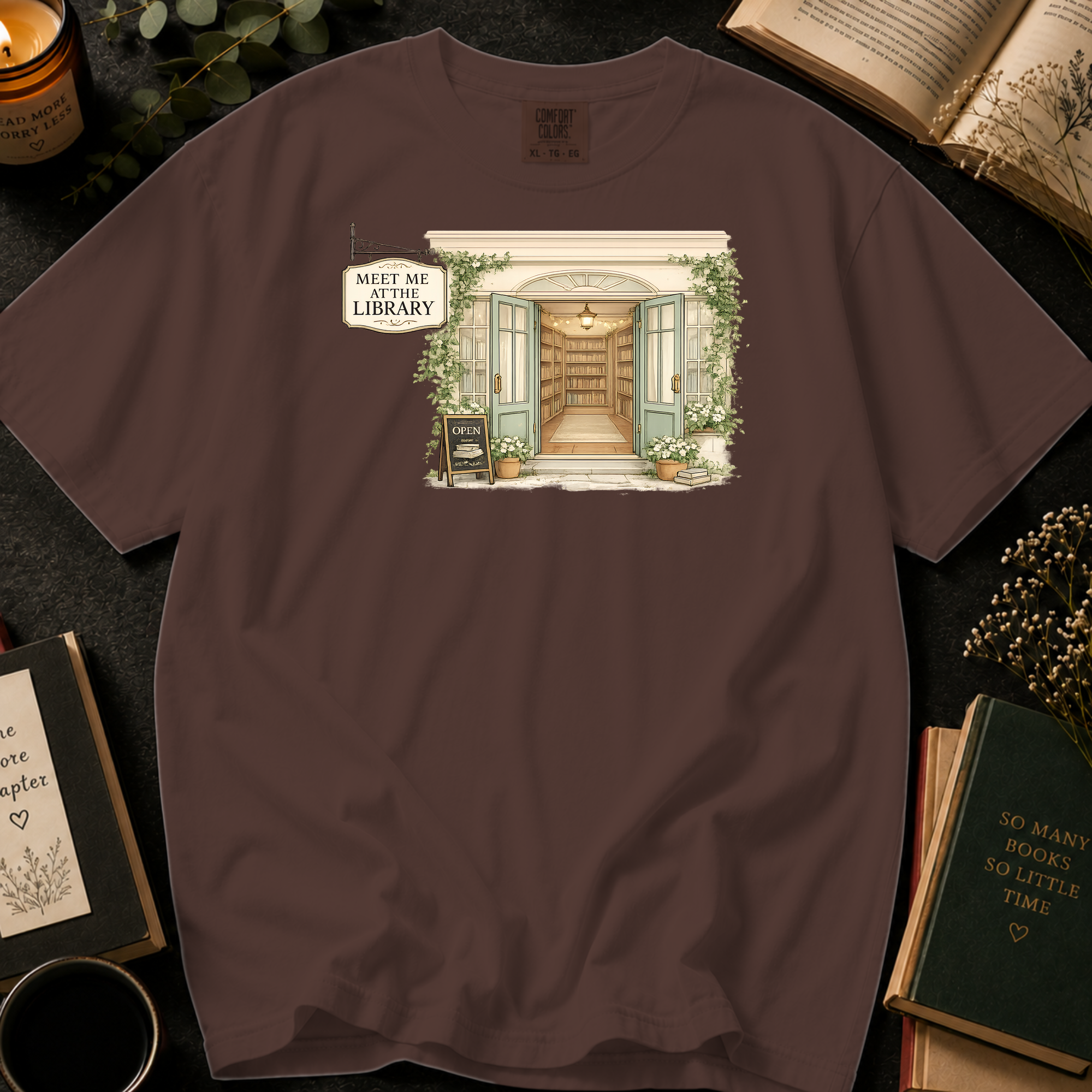 Meet Me At The Library T-Shirt: Cozy Bookshop Storefront in Espresso - Comfort Colors® T-Shirt