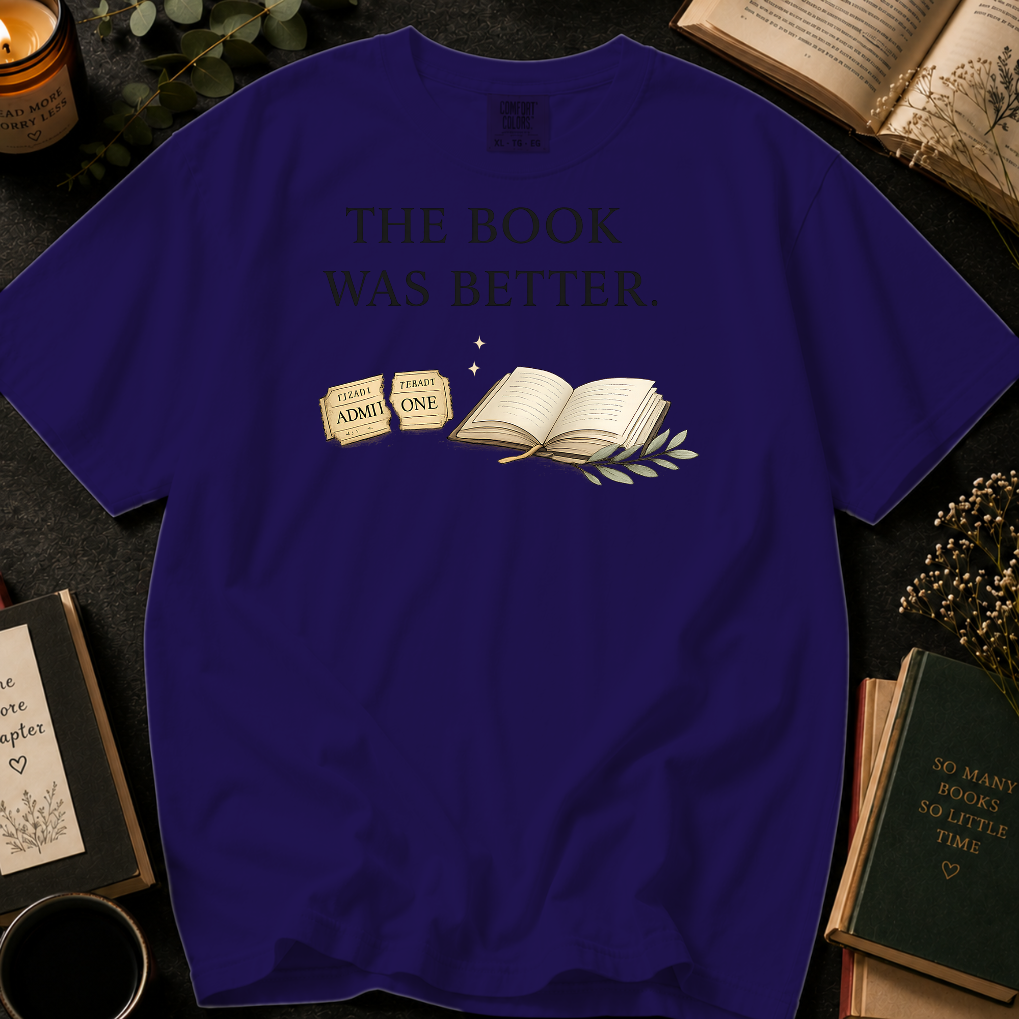 The Book Was Better T-Shirt: Movie Ticket in Grape - Comfort Colors® T-Shirt