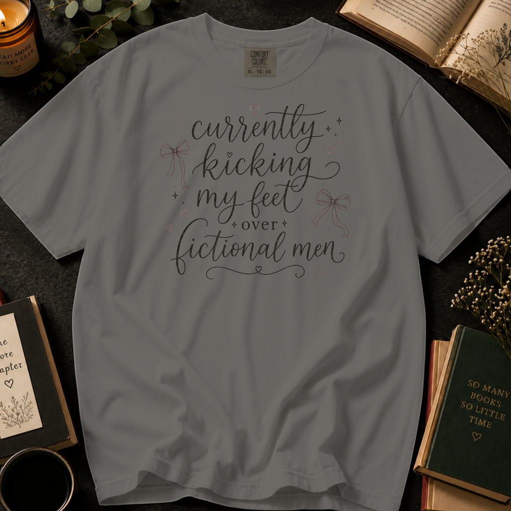 Currently Kicking My Feet Over Fictional Men T-Shirt: Script and Bows in Grey - Comfort Colors® T-Shirt