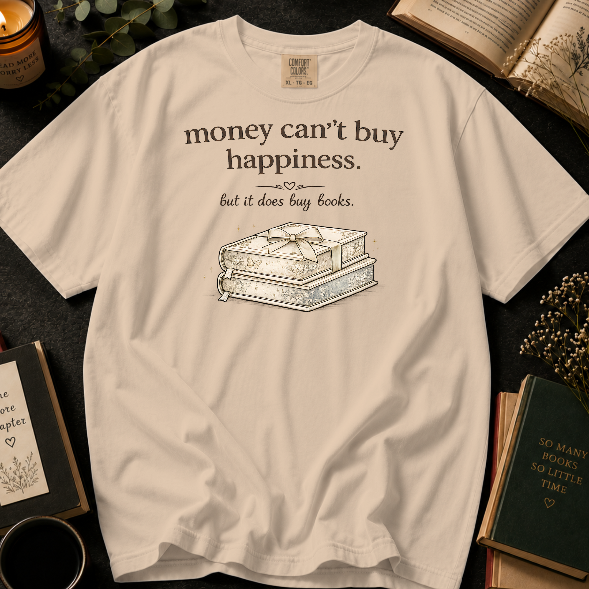 Money Can't Buy Happiness But It Does Buy Books T-Shirt: Gift Wrapped Stack in Ivory - Comfort Colors® T-Shirt