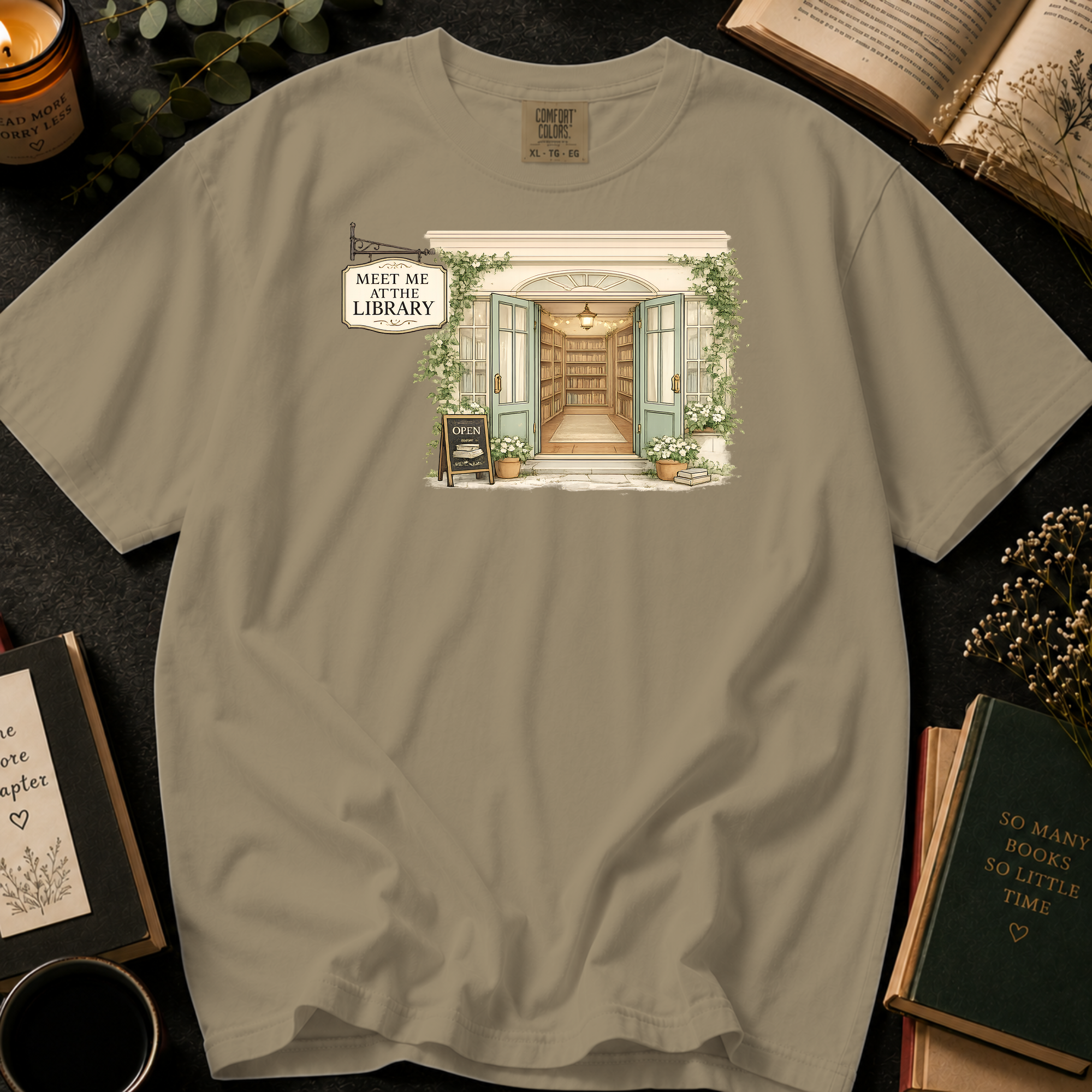 Meet Me At The Library T-Shirt: Cozy Bookshop Storefront in Khaki - Comfort Colors® T-Shirt