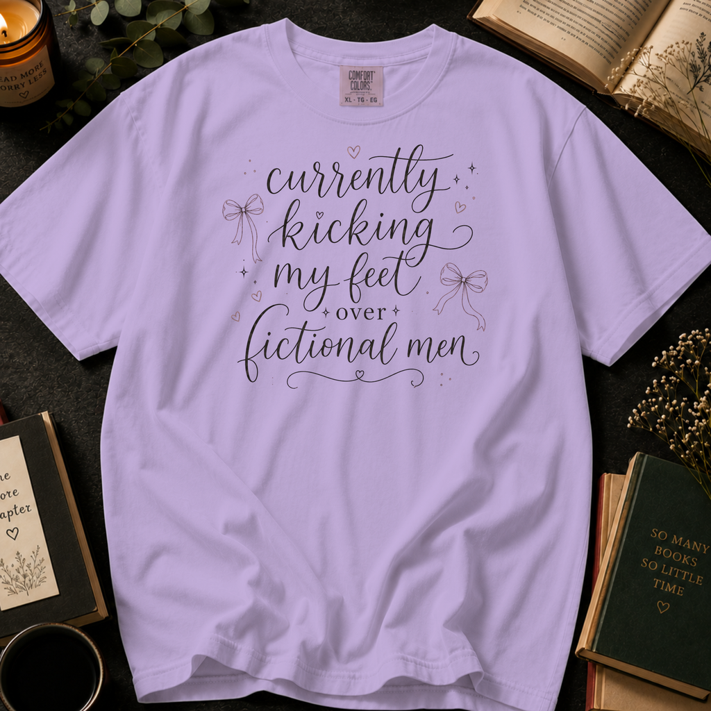 Currently Kicking My Feet Over Fictional Men T-Shirt: Script and Bows in Orchid - Comfort Colors® T-Shirt