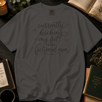Currently Kicking My Feet Over Fictional Men T-Shirt: Script and Bows in Pepper - Comfort Colors® T-Shirt