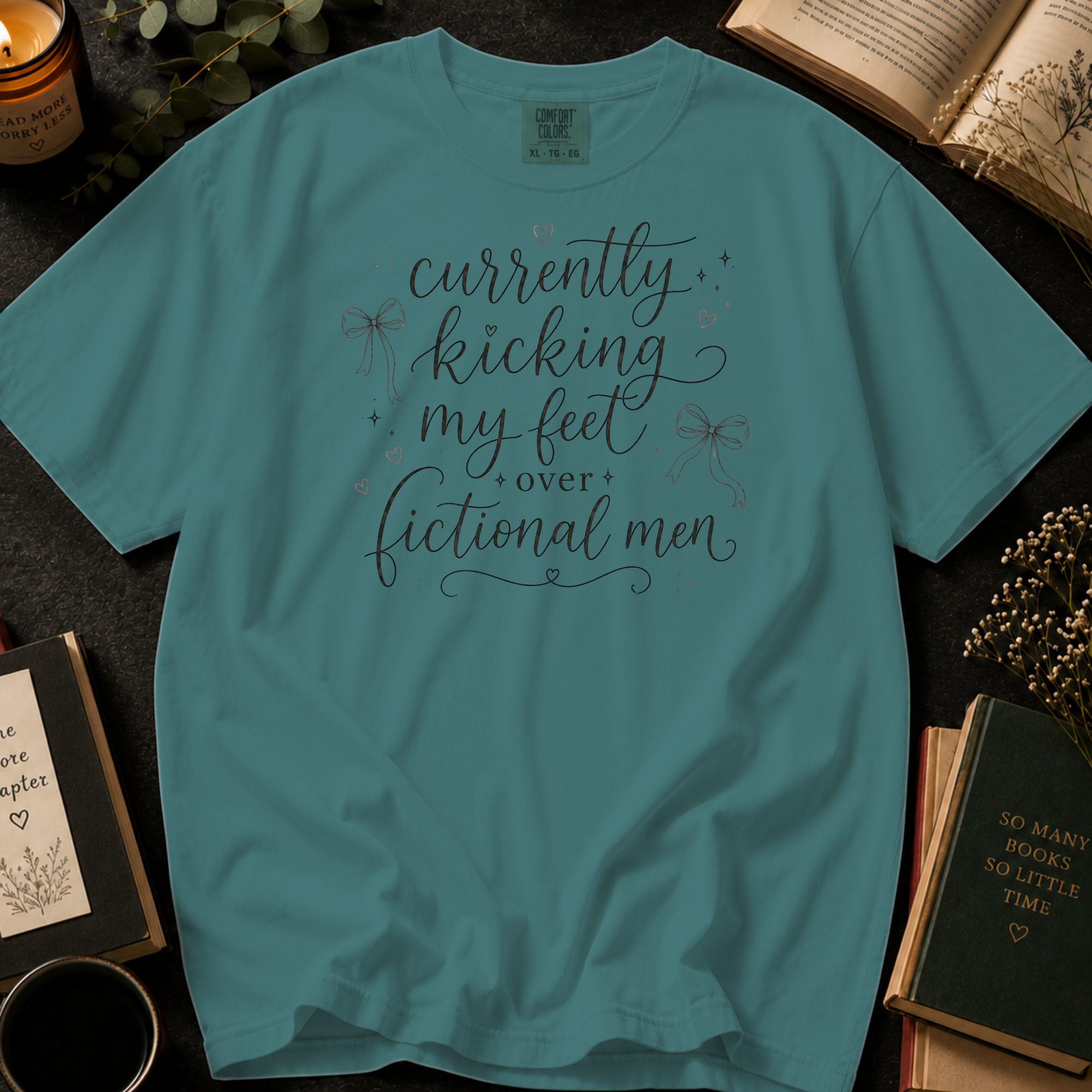 Currently Kicking My Feet Over Fictional Men T-Shirt: Script and Bows in Seafoam - Comfort Colors® T-Shirt
