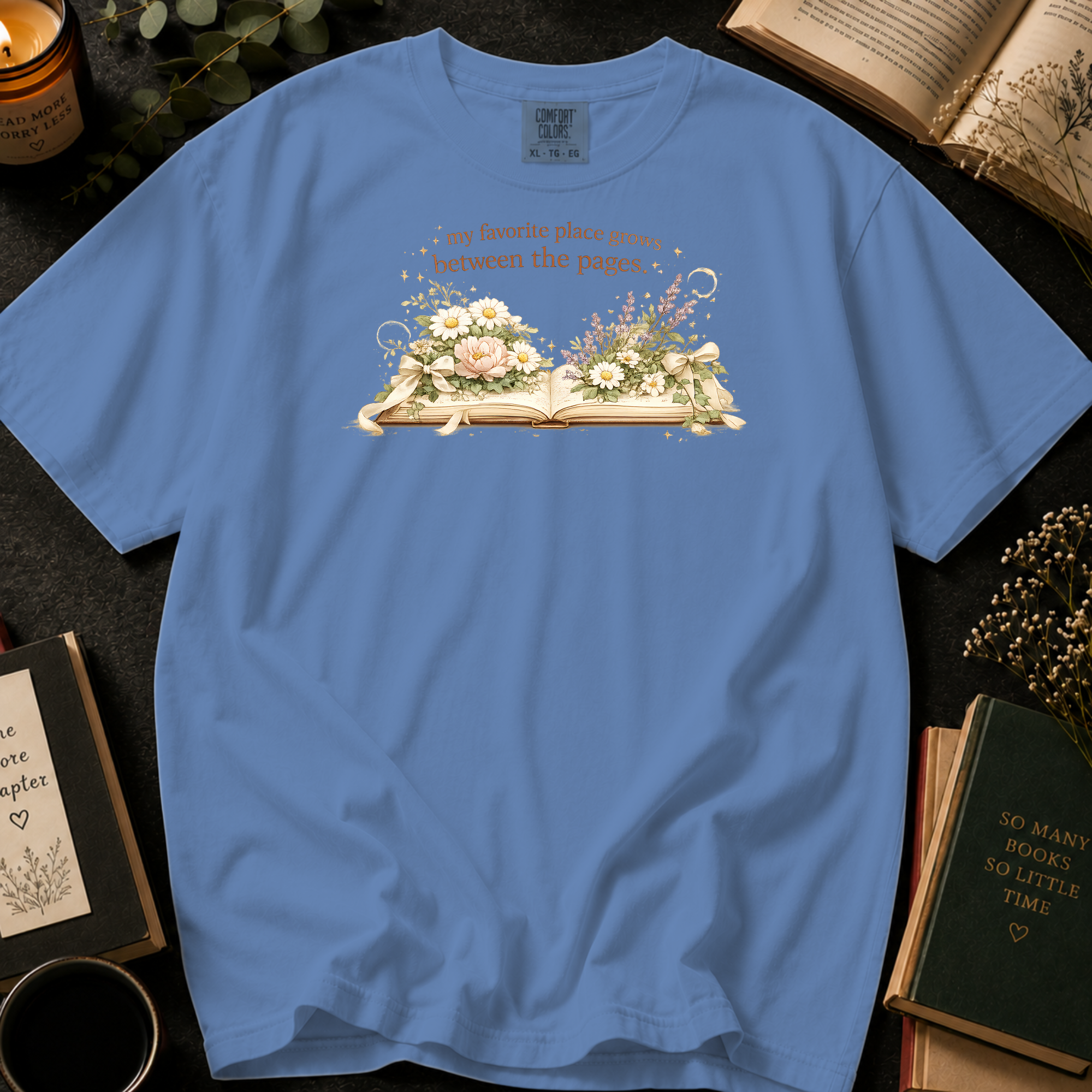 My Favorite Place Grows Between the Pages T-Shirt: Floral Open Book in Washed Denim - Comfort Colors® T-Shirt