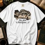 The Plot Thickens T-Shirt: Grumpy Raccoon Reading in White - Comfort Colors® T-Shirt