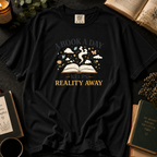 A Book A Day Keeps Reality Away T-Shirt: Cozy Morning Flatlay in Black - Comfort Colors® T-Shirt