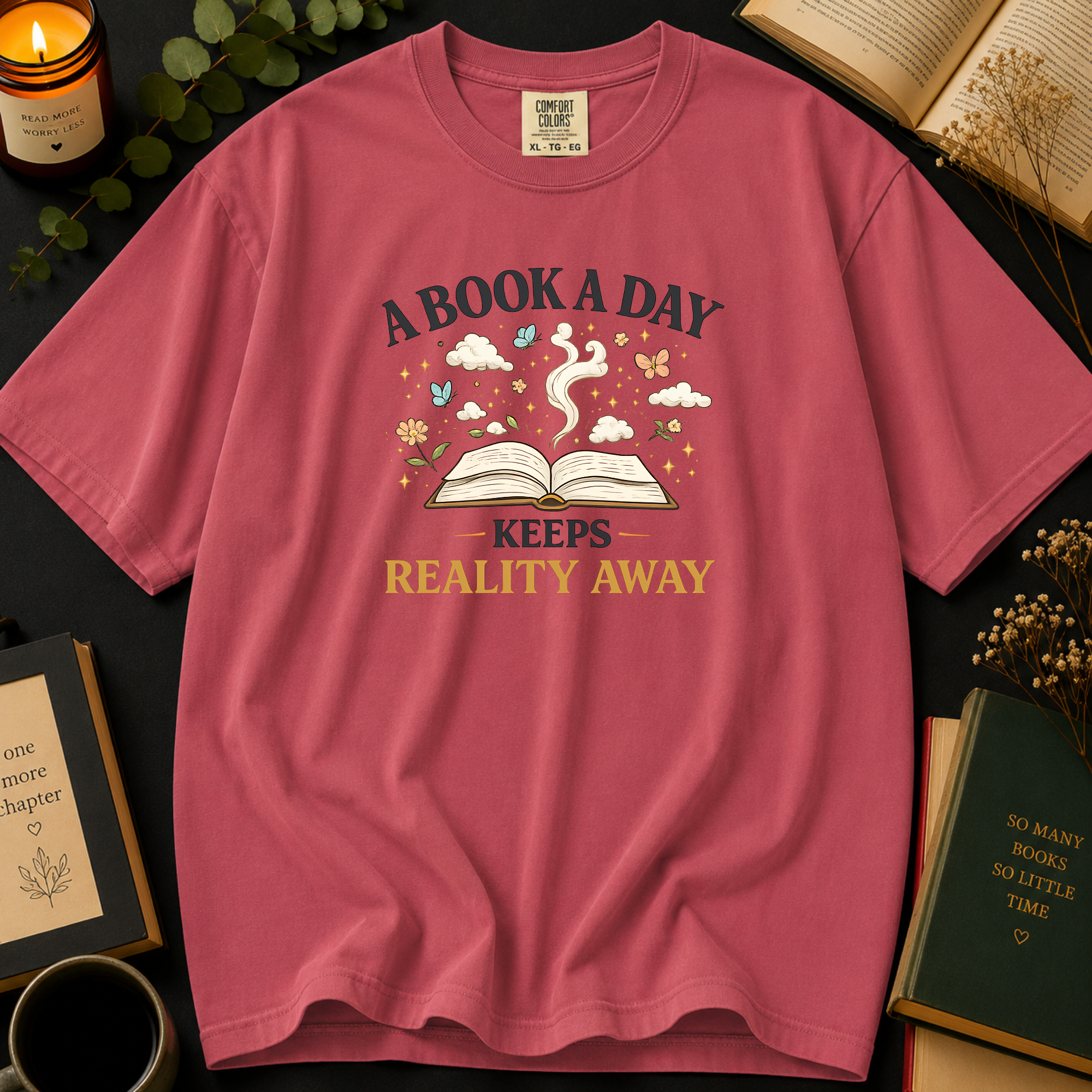 A Book A Day Keeps Reality Away T-Shirt: Cozy Morning Flatlay in Crimson - Comfort Colors® T-Shirt