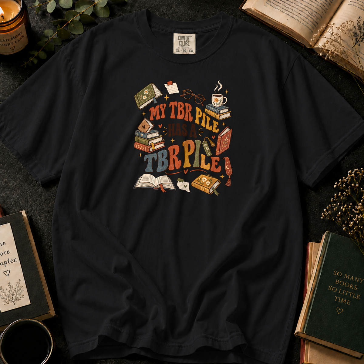My TBR Pile Has a TBR Pile T-Shirt in Black, Between the Pages