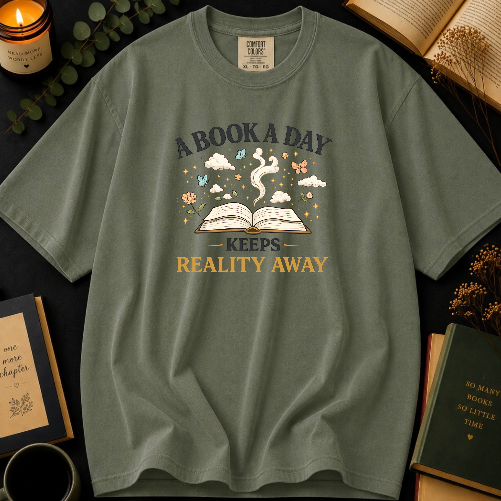 A Book A Day Keeps Reality Away T-Shirt: Cozy Morning Flatlay in Sage - Comfort Colors® T-Shirt